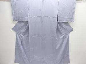 逆雲取りに平安人物模様織出し一ツ紋付け下げ色無地着物